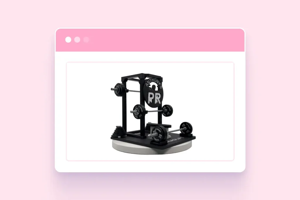 Personalized gym equipment display featuring barbells and weight plates with custom name and “PR” lettering on a black stand