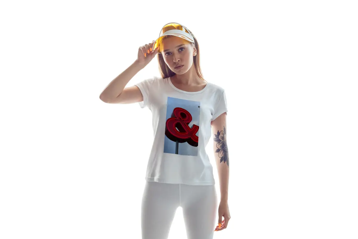 Model wearing white t-shirt with high-resolution DTF printed ampersand graphic design