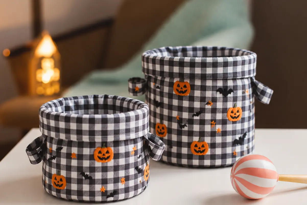 Personalized gingham Halloween baskets with pumpkin and bat designs